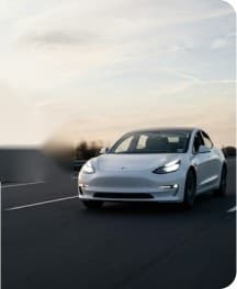 Electric car driving on an open road